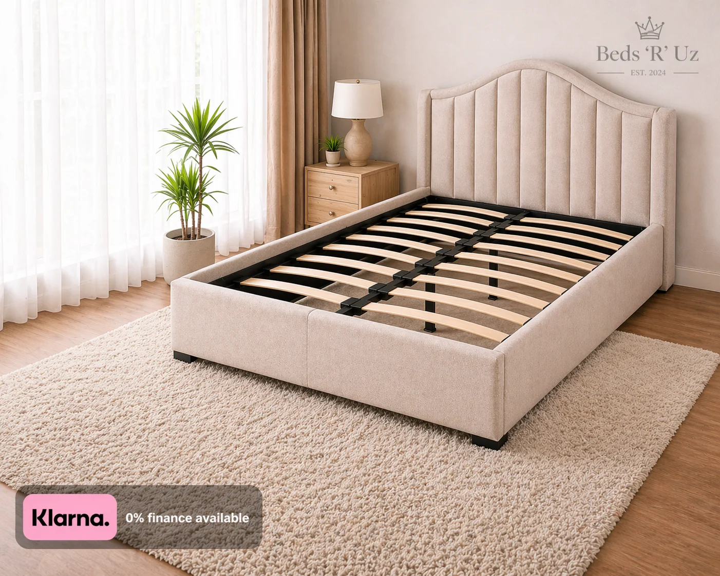 Clifton upholstered bed frame with slatted base in stylish UK bedroom